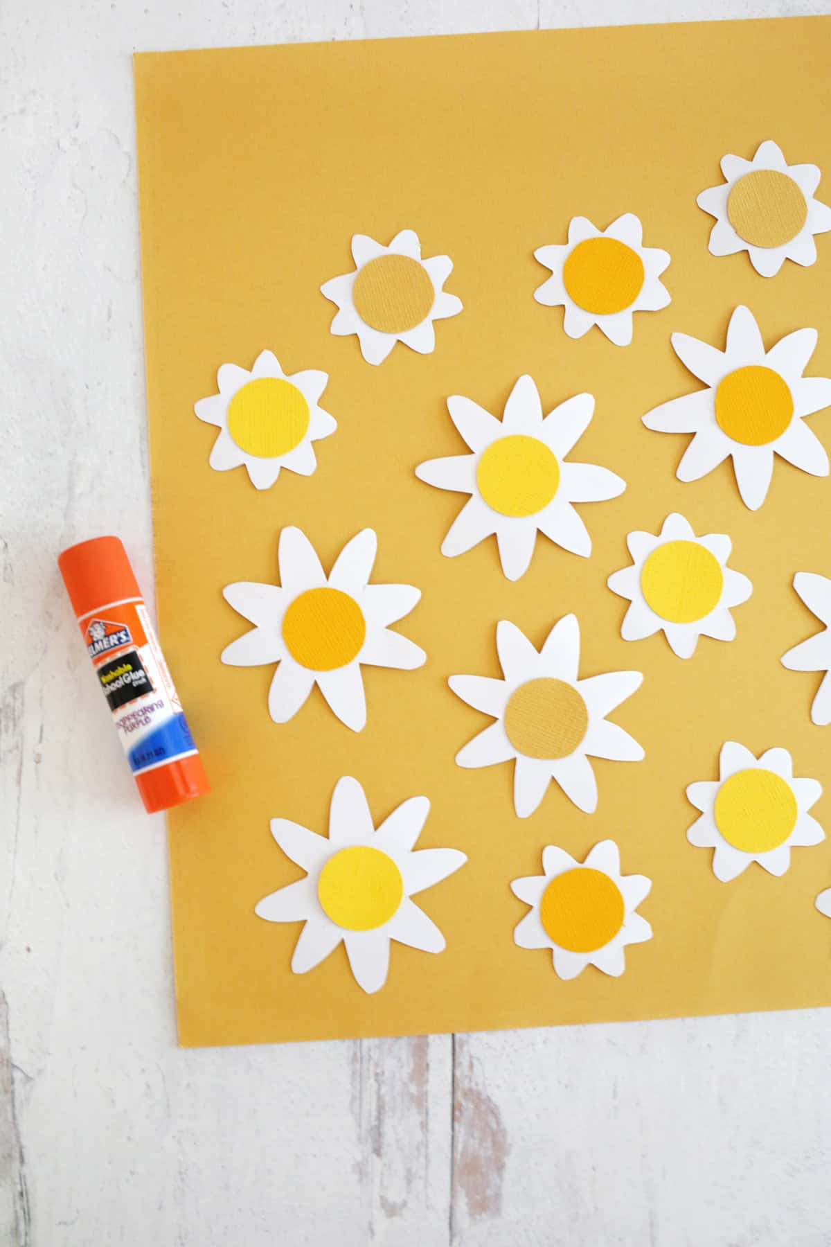 gluing paper daisies together