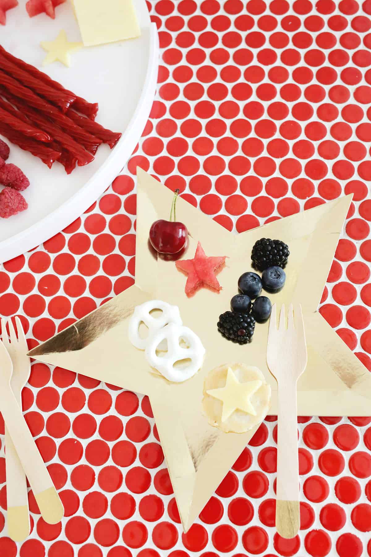 gold star plate with red, white, and blue foods