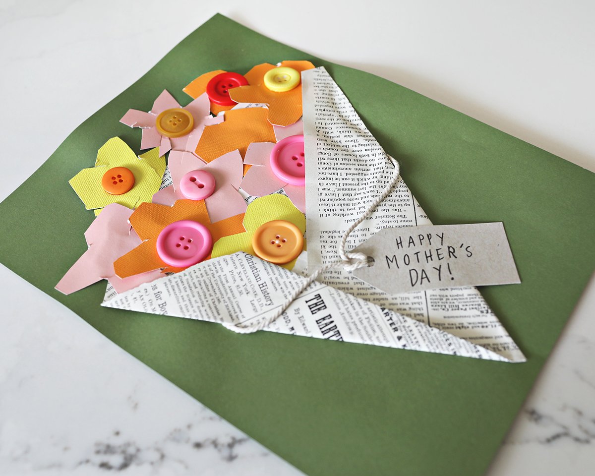 Homemade mother's day card with paper and buttons. 