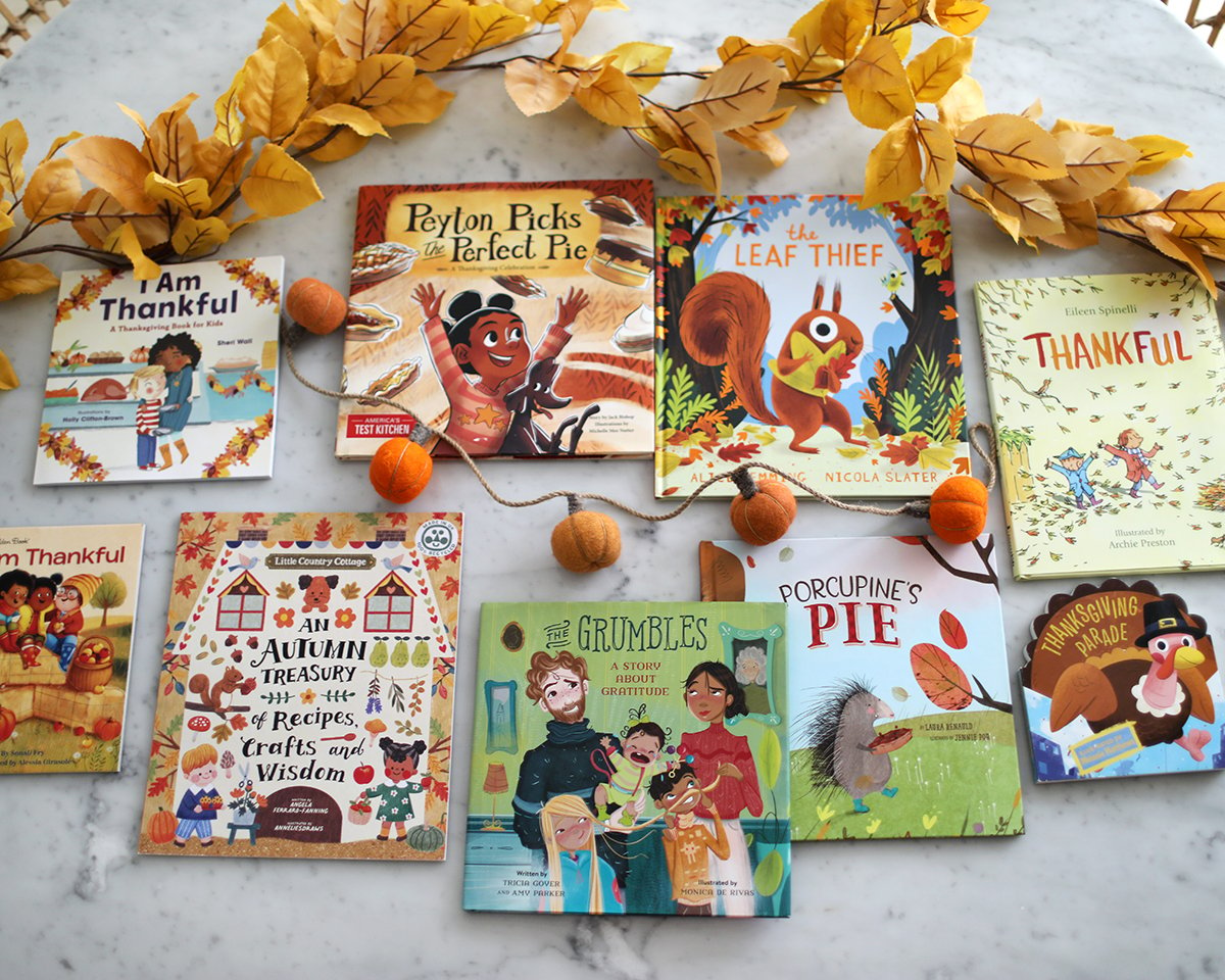Thanksgiving books for kids with fall garlands. 