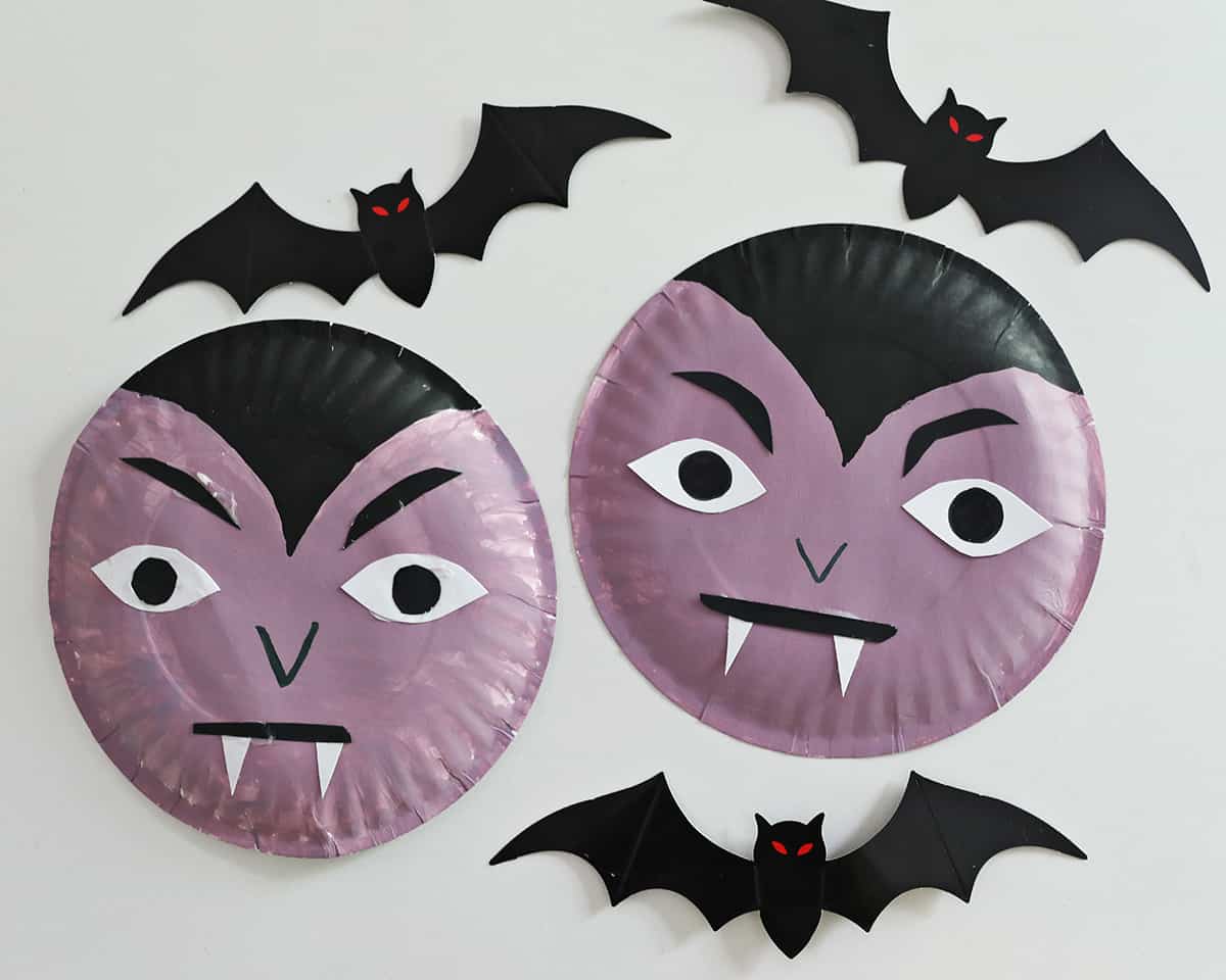 paper plates painted to look like dracula. 
