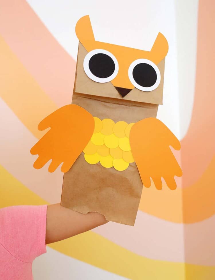 paper bag owl puppet on hand