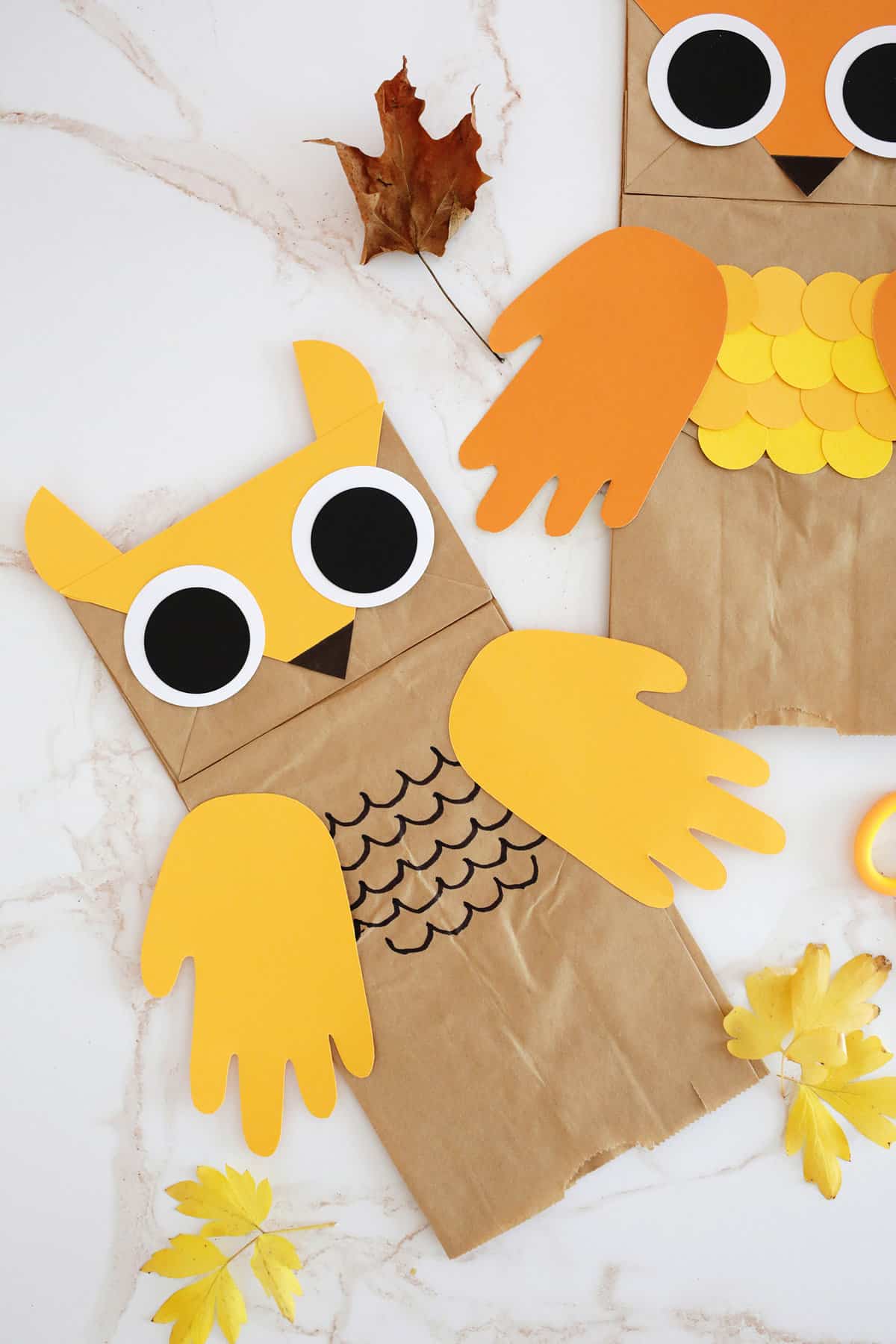 Paper bag owl puppets. 