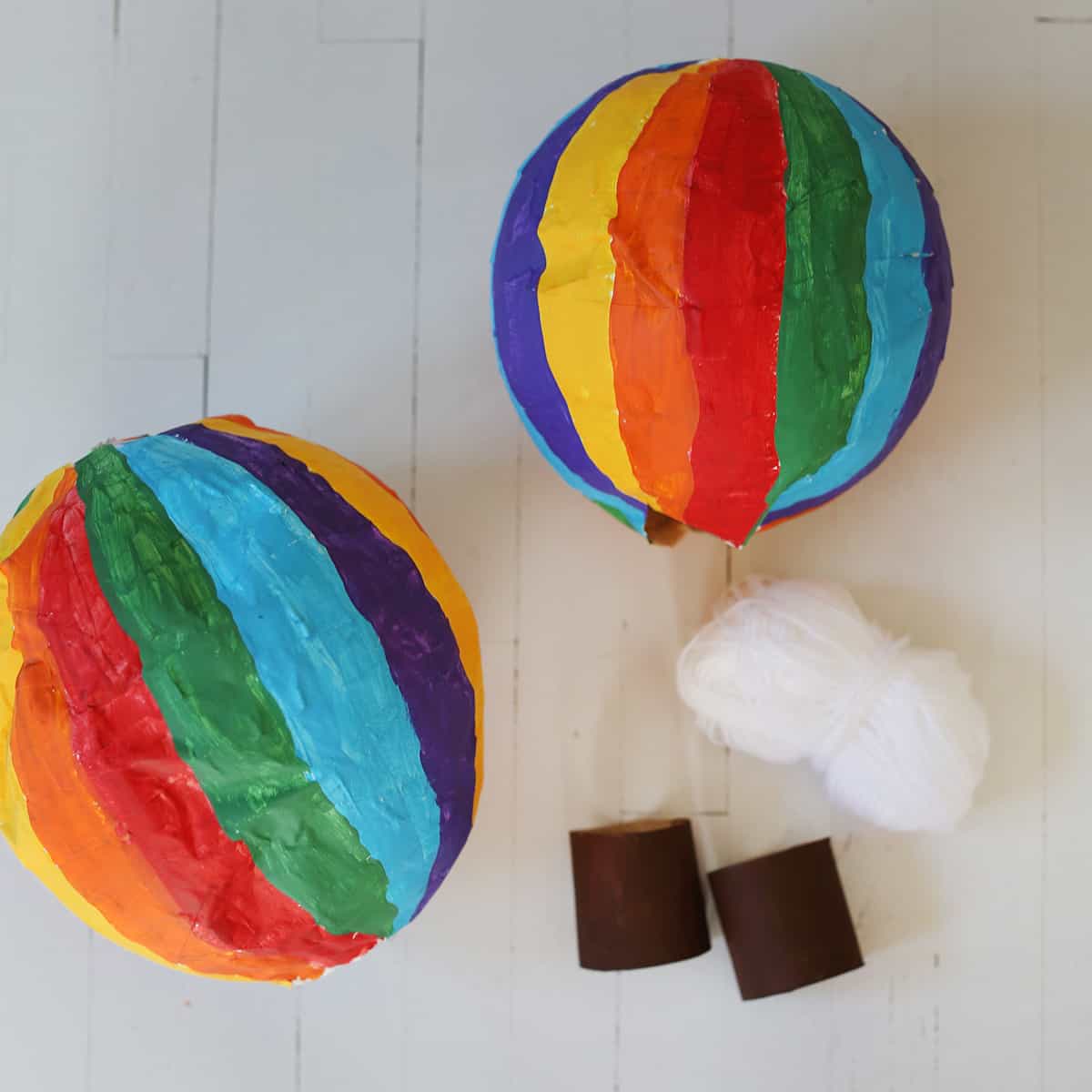 Hot air balloon craft made with paper mache and toilet paper rolls. 