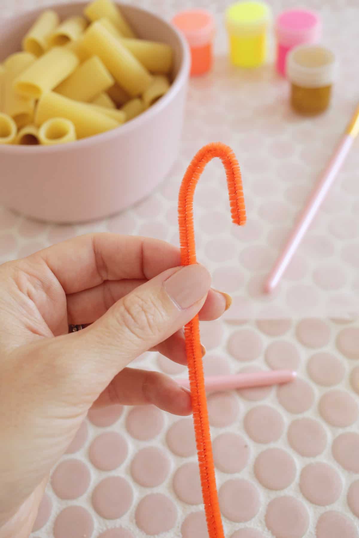a pipe cleaner into a hook