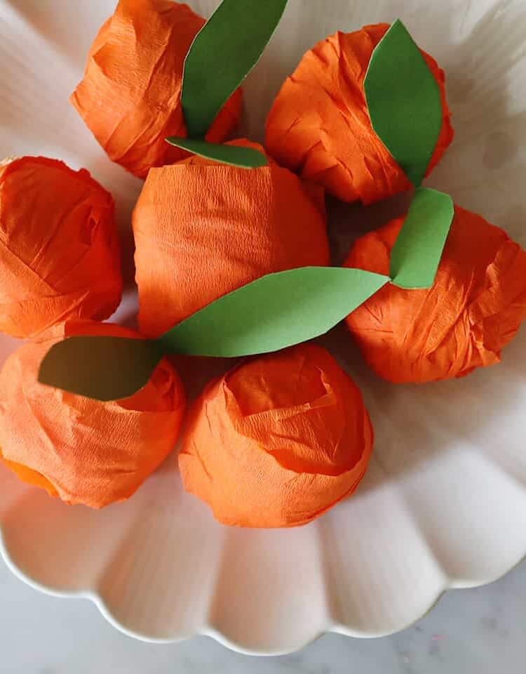suprise balls made with crepe paper to look like an orange for Lunar New Year.