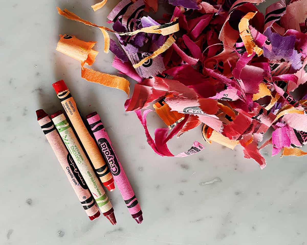 Crayons and crayon wrapper peelings. 