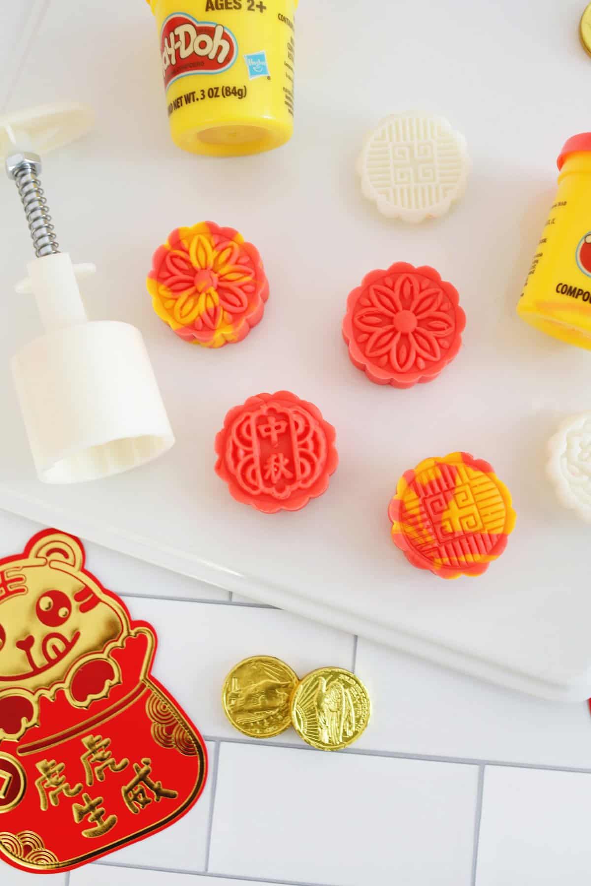 Mooncakes made with play dough for lunar new year mid-autumn festival