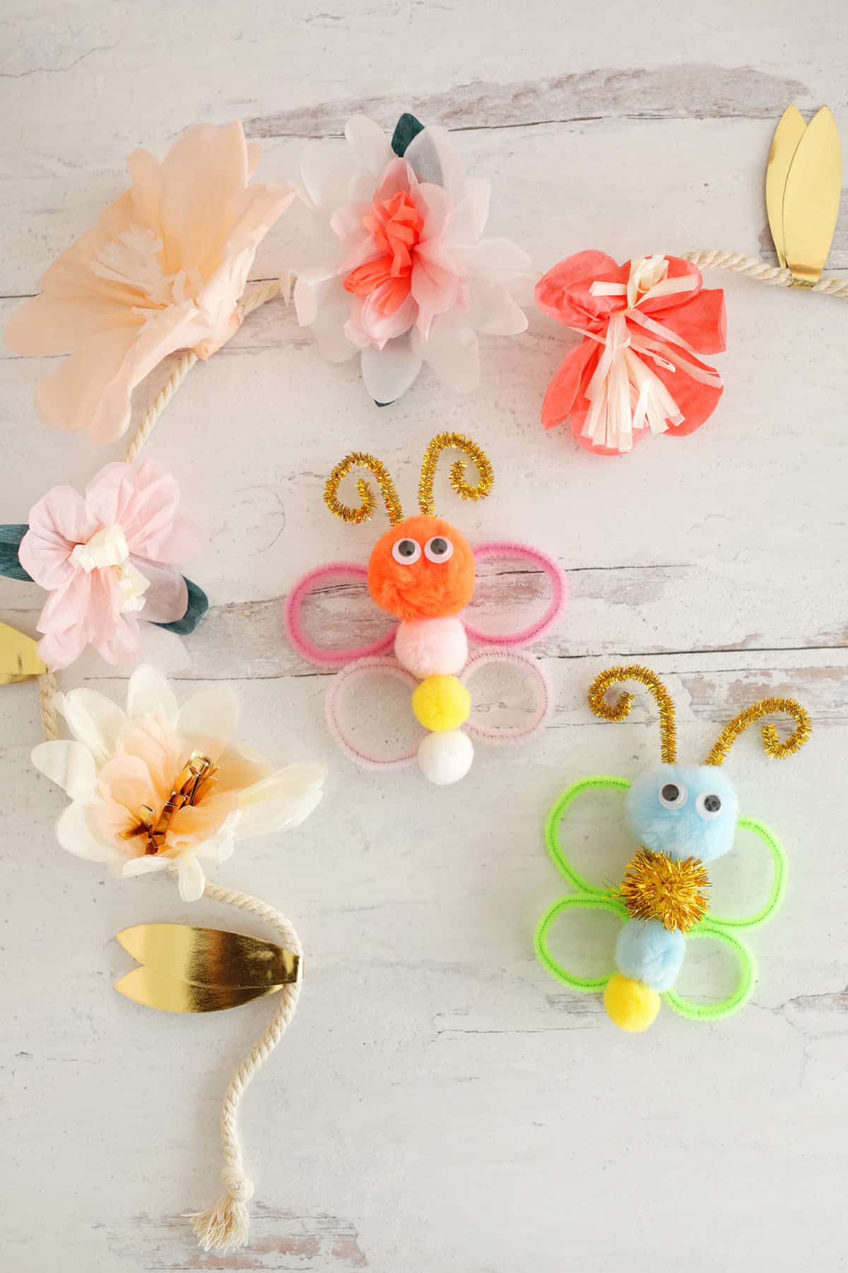 Butterfly clothespin with pom poms and pipe cleaner wings