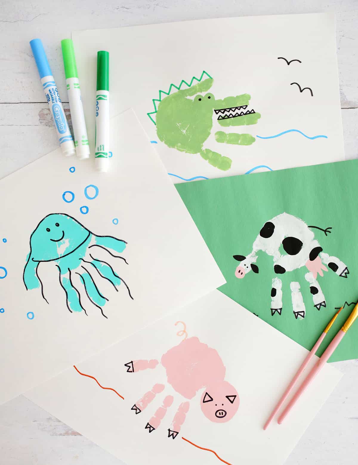 10 Handprint Animal Crafts That Kids Will Love! - Childhood Magic