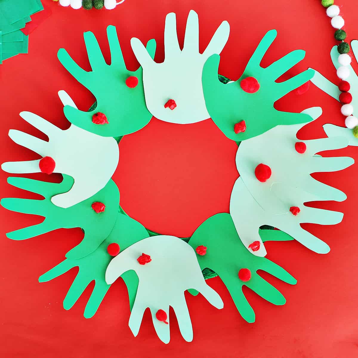 Kids handprint Christmas wreath.