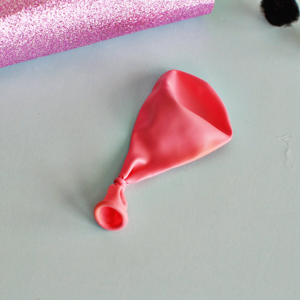 Pink balloon tied.
