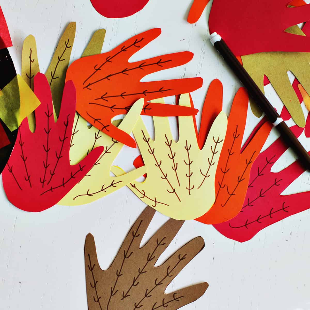 Kids handprints made to look like leaves.