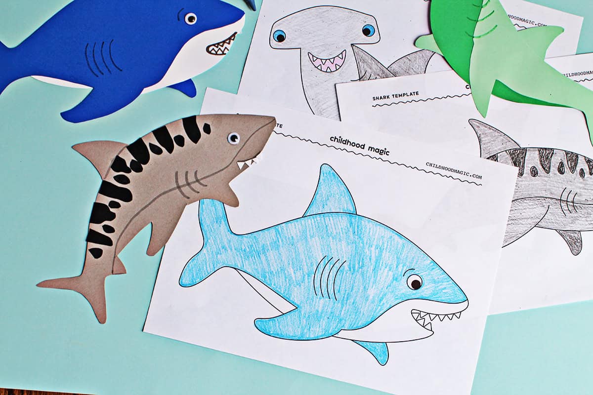 Shark cutout template and coloring page for kids.