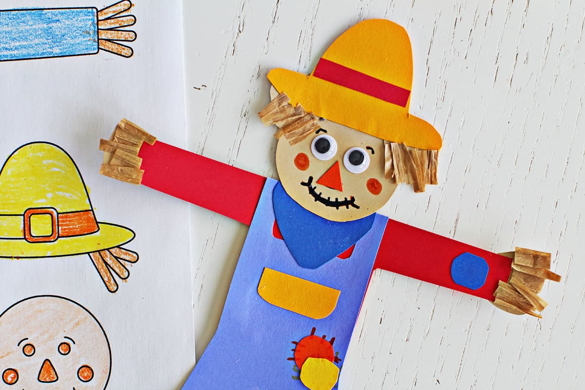 scarecrow craft using cardstock, googley eyes and ribbon.