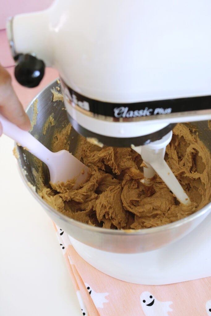 making dough for peanut butter cup spider cookies