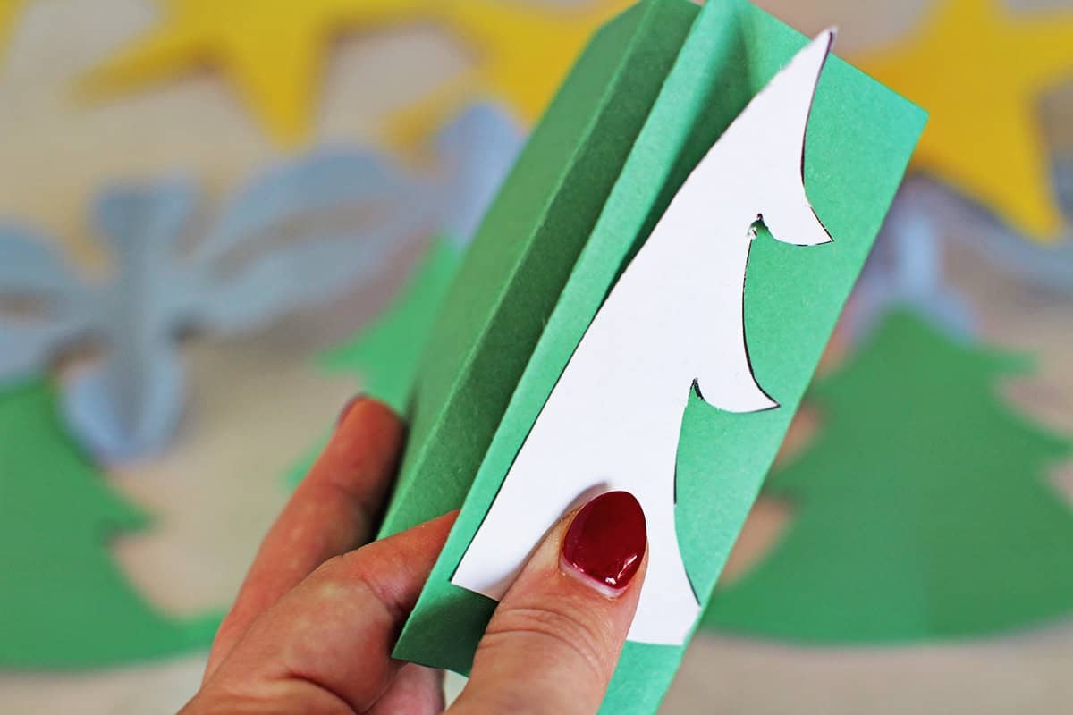 accordian fold paper to make chain.