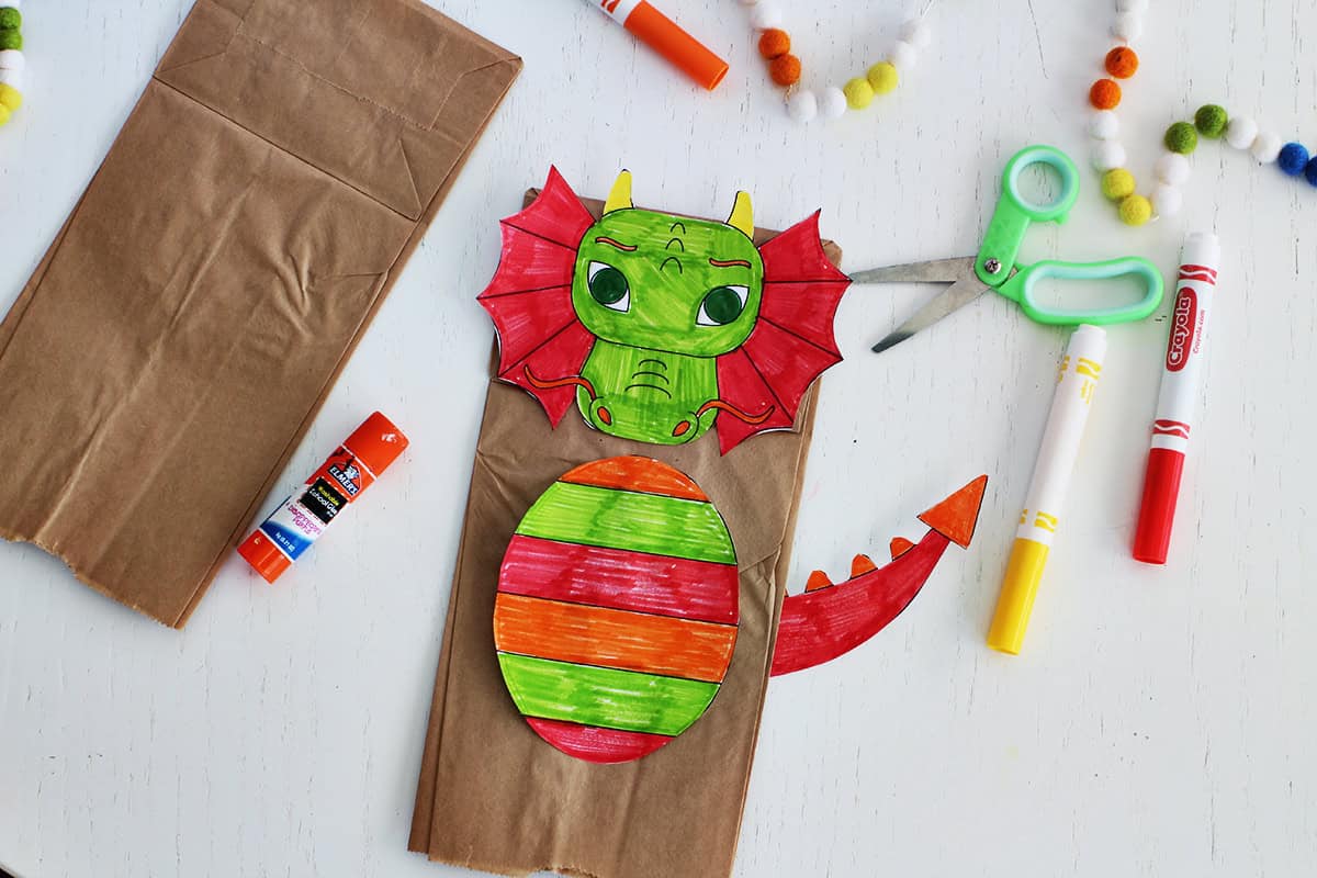 Dragon paper bag puppet craft.