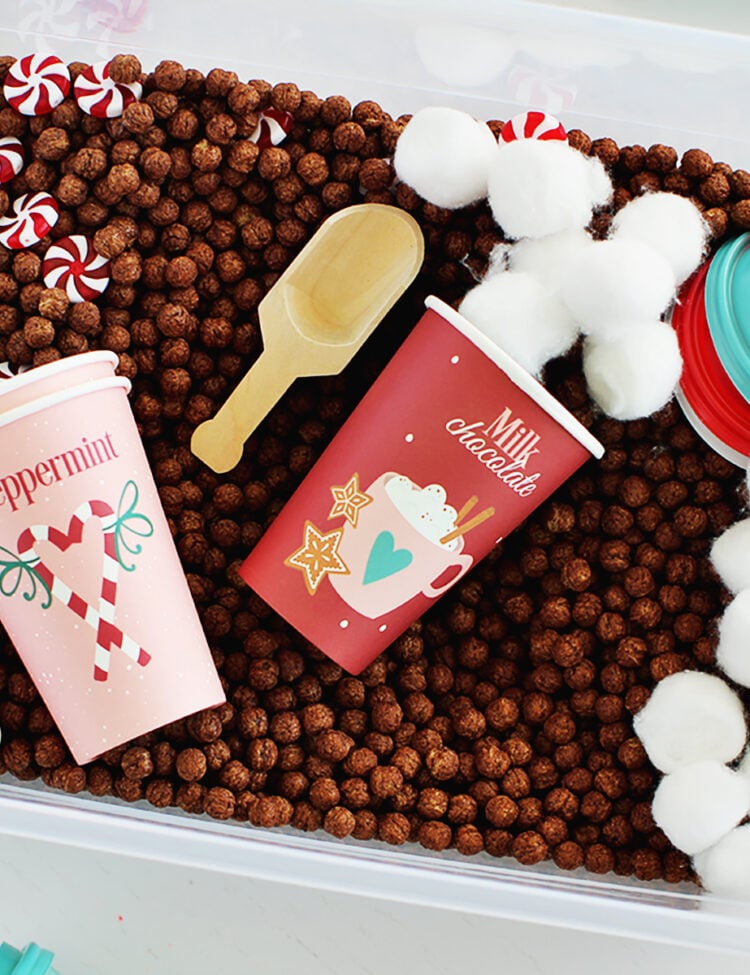 sensory bin making pretend hot cocoa.