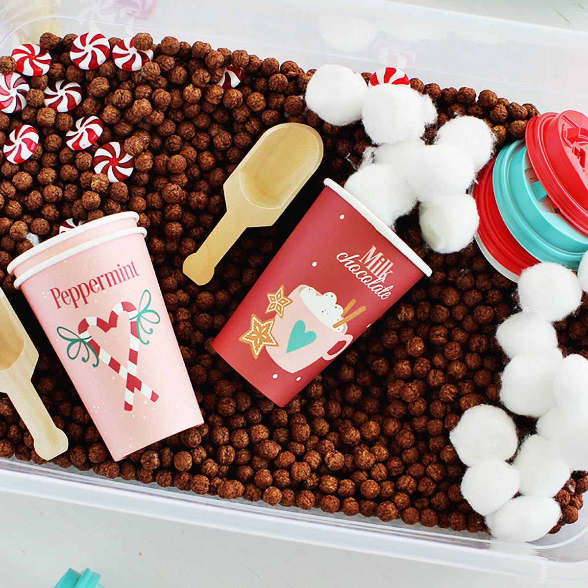 sensory bin making pretend hot cocoa.