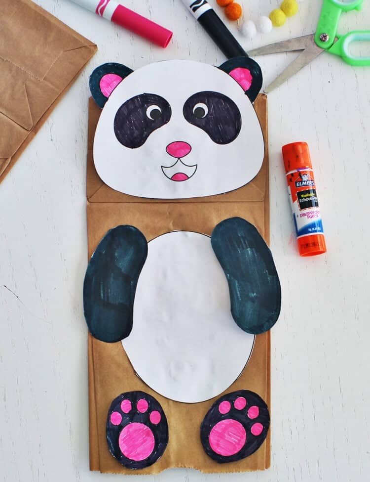 Paper bag puppet made to look like a panda.