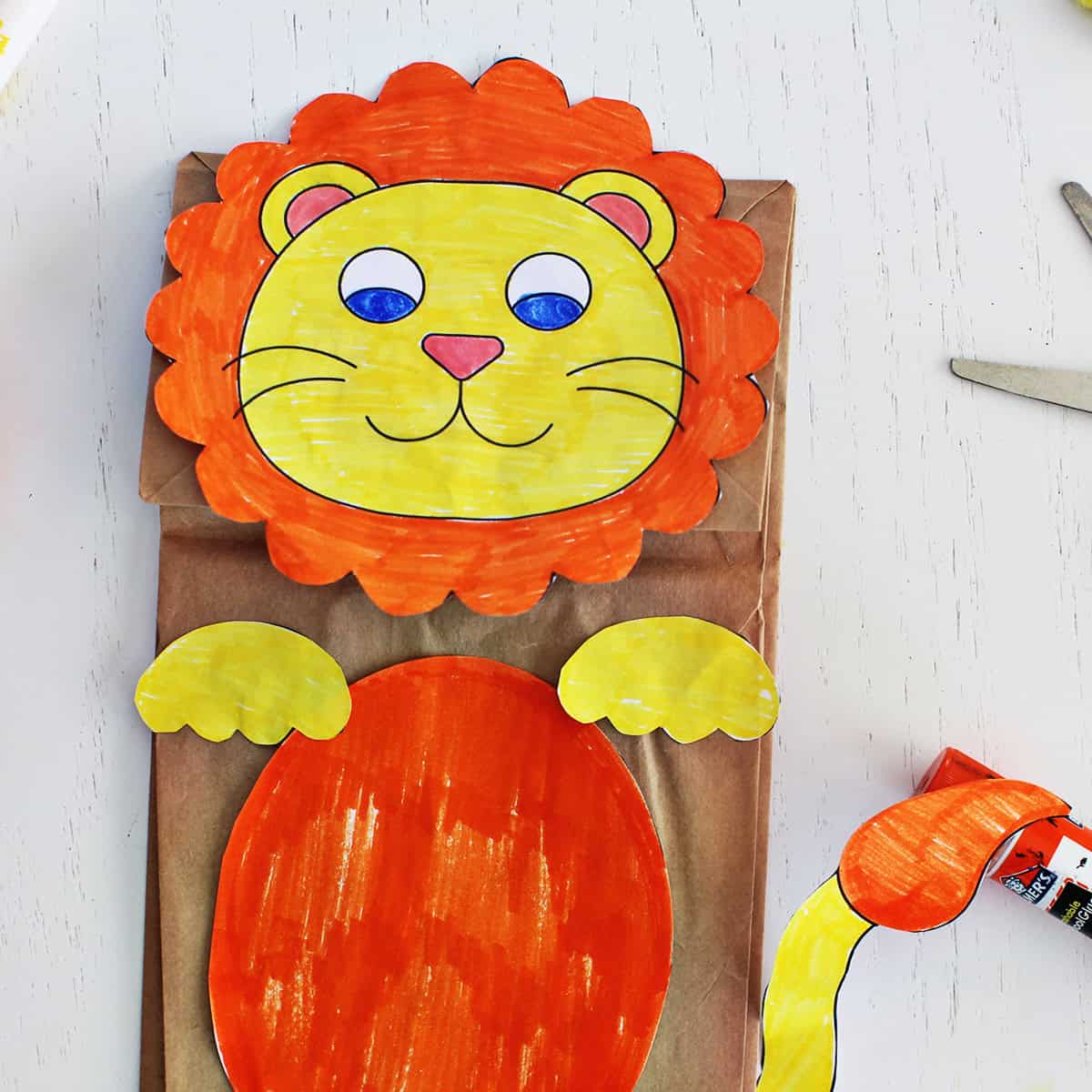 Lion paper bag puppet.