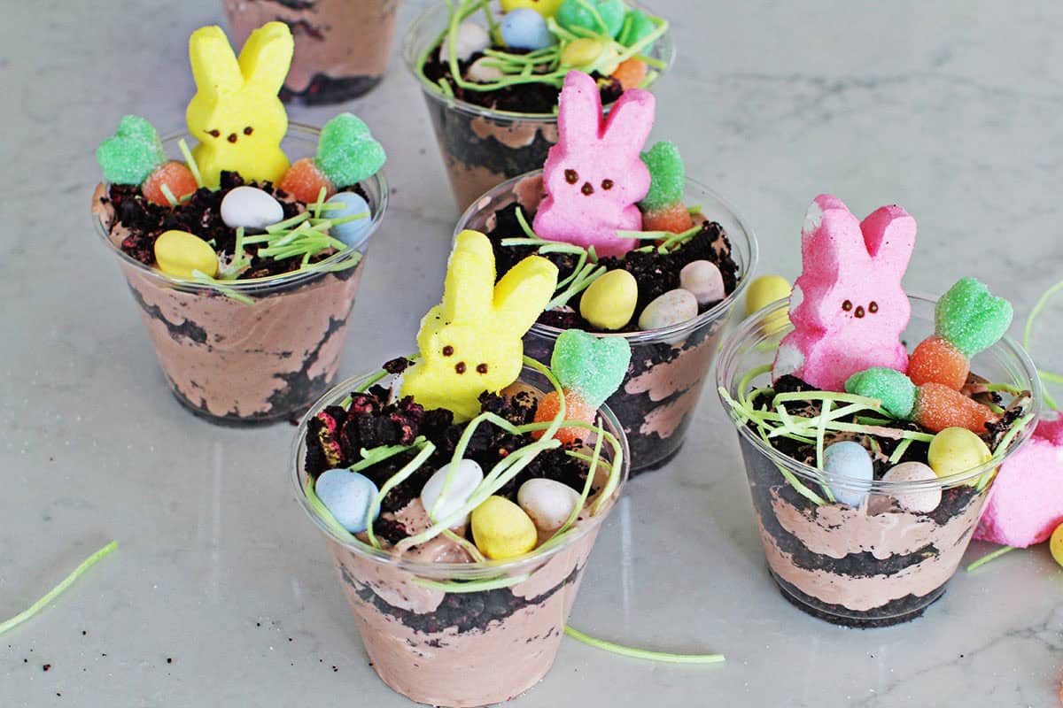Clear cups filled with chocolate pudding mixture, crushed oreos and Easter candy.