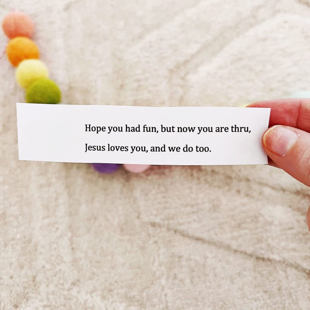 hand holding a piece of paper saying a scavenger hunt is complete.