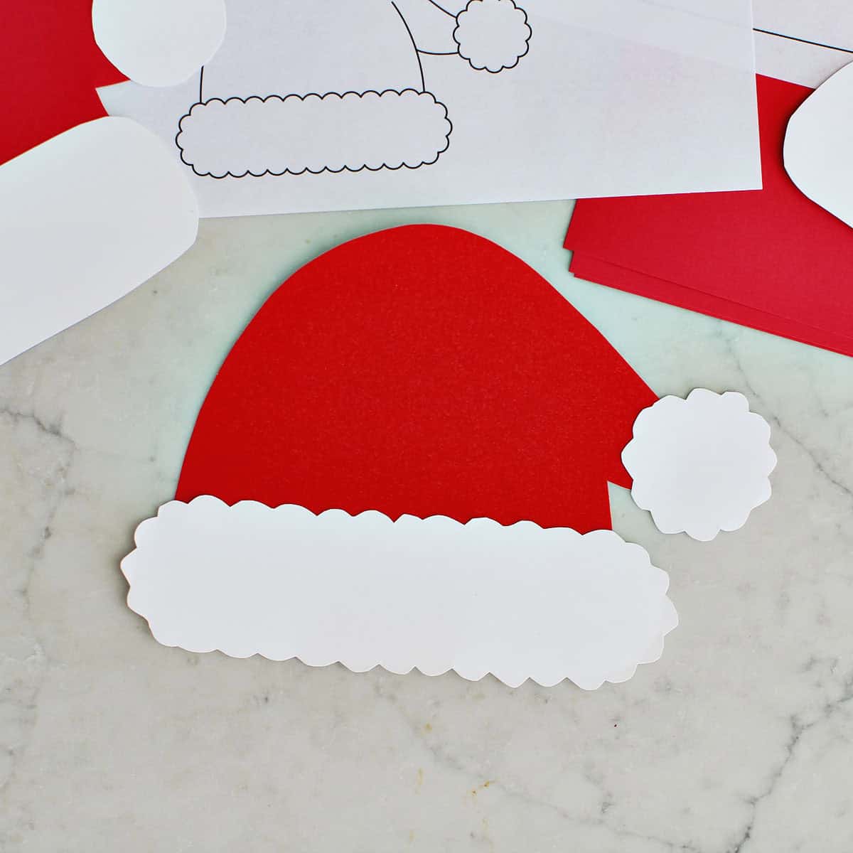 Santa hat made from a template and cardstock paper.