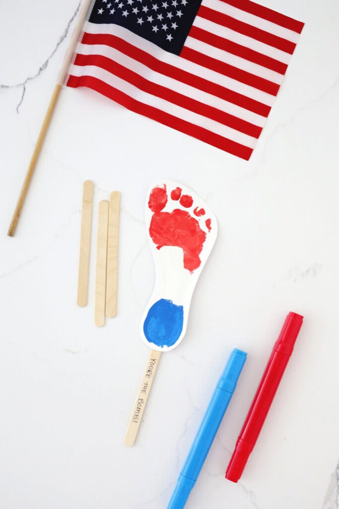 a footprint print mae with red, white and blue paint to look like a popsicle.