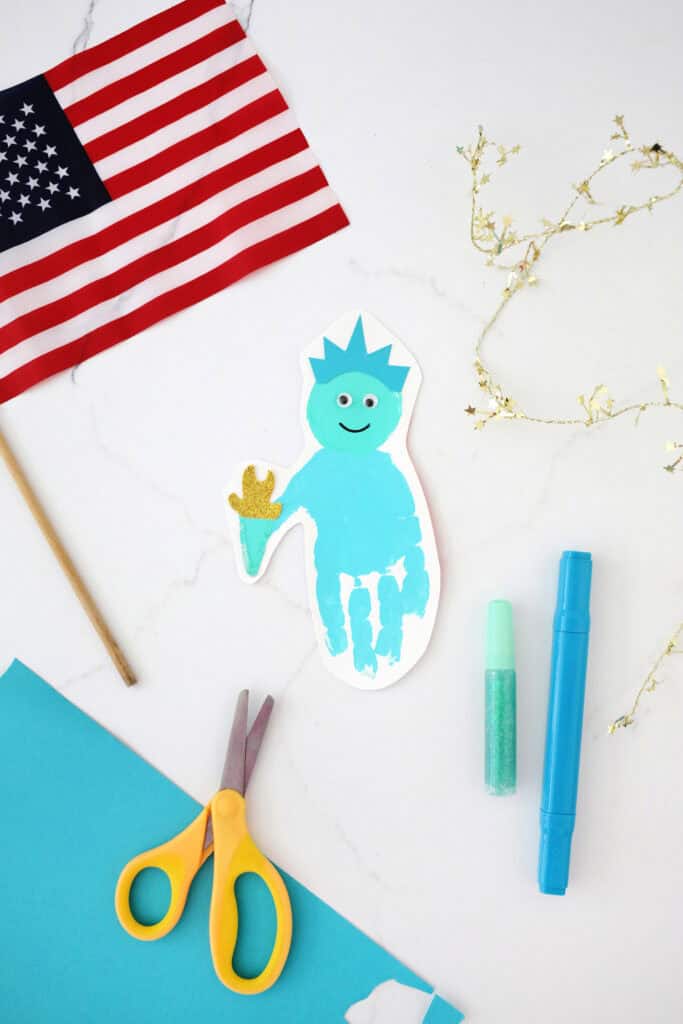 Fourth of July handprint craft made to look like the statue of liberty.