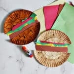 paper plates and construction paper glued together to look like hamburgers.