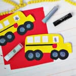 paper plate painted yellow and cut out to look like a school bus.