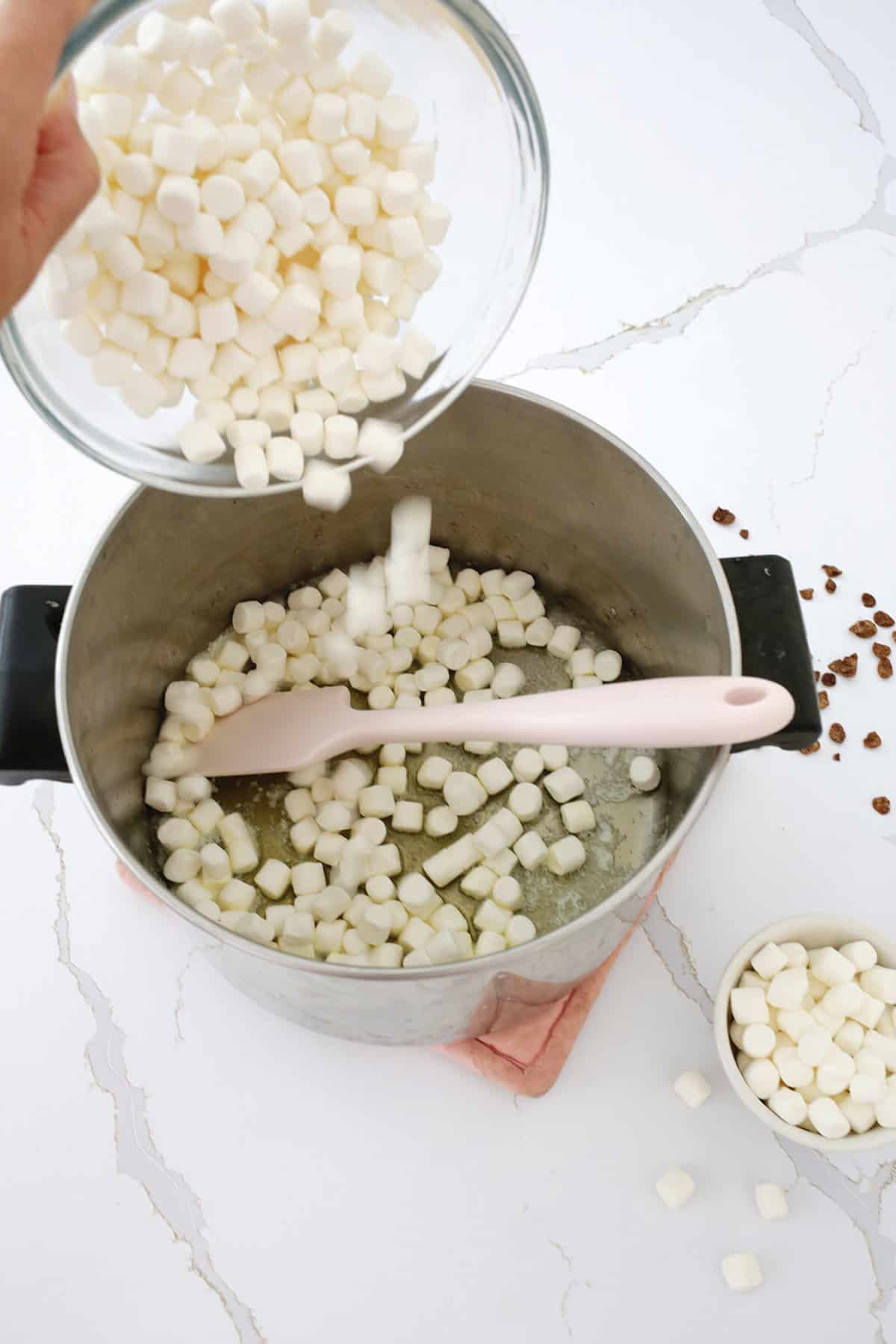 melting marshmallows and butter for rice krispies treats