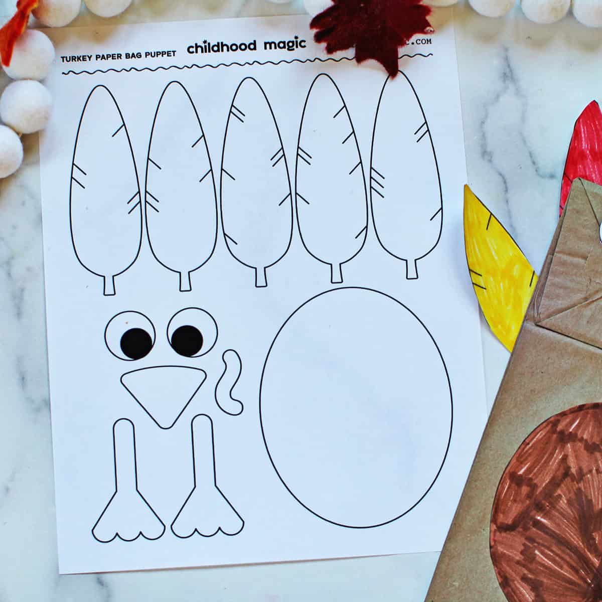 Print out of turkey face and feathers to make a paper bag puppet.